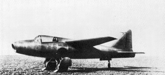 Black and white image of the Heinkel He 178, the world’s first aircraft to fly under turbojet power, sitting on a grassy airfield during early jet engine testing.